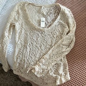 Beautiful Anthropologie cream colored sheer lace long sleeve blouse